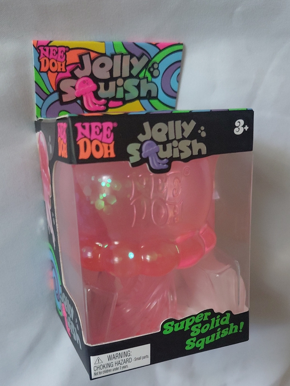 Schylling NeeDoh Jelly Squish Pink Glitter